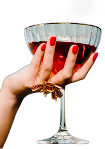 Hand holding a glass